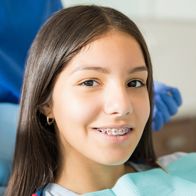 girl with braces at the orthodontist