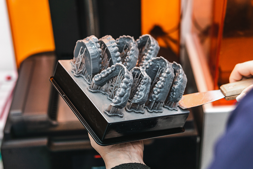 3D printed teeth models still attached to the build plate